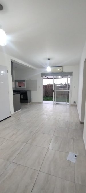 DEPARTAMENTO DE 3 AMB. EN PB CON JARDIN EN BARRIO CERRADO CASUARINAS PREMUM ALQUILER